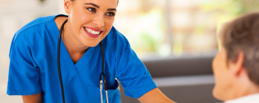 Home health nurse providing senior care at home